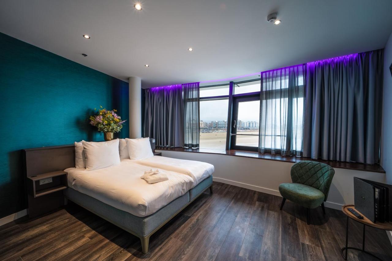 Penthouse-Zimmer mit Strandblick